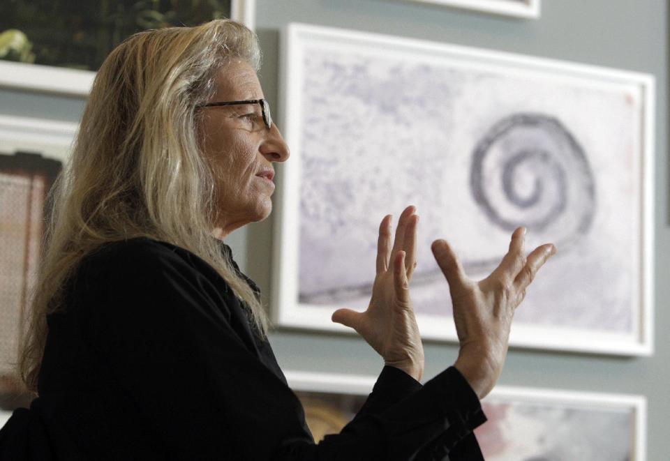 Annie Leibovitz answers questions during an interview before the opening of her exhibition at the Wexner Center for the Arts Friday, Sept. 21, 2012, in Columbus, Ohio. Leibovitz's exhibition features work from her “Master Set,” an authoritative edition of 156 images. (AP Photo/Jay LaPrete)