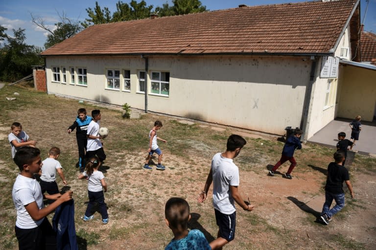 In their ethnically divided school, Kosovo Albanian children only meet up with their Serb counterparts on the playing field