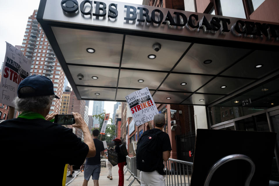 People protesting outside CBS