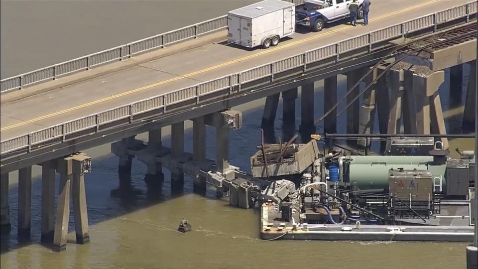 Oil spills into the surrounding waters after a barge hit a bridge in Galveston, Texas, on Wednesday, May 15, 2024. A bridge that leads to Pelican Island, located just north of Galveston, was hit by a barge around 9:30 a.m., said Ronnie Varela, with the Galveston’s Office of Emergency Management.(KTRK via AP)