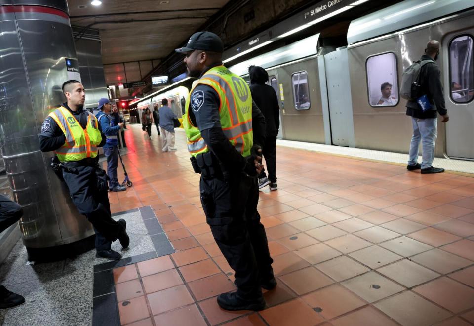 Security officers in a Metro station.