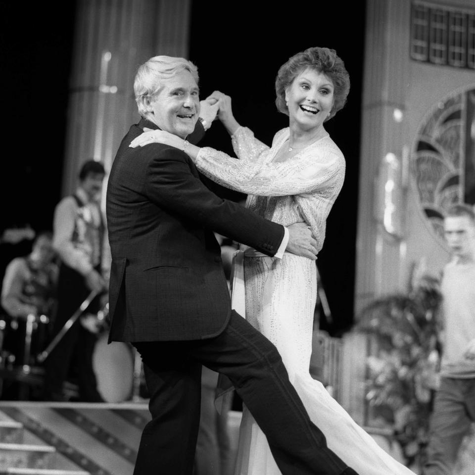 Ernie Wise, one half of British comedy duo known as 'Morecambe and Wise'- with TV Presenter ANGELA RIPPON in a scene from The Morecambe and Wise Show. Date, 09.11.1984.   (Photo by Avalon/Getty Images)