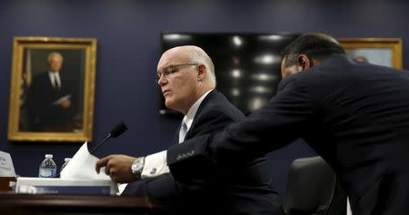 U.S. Secret Service Director Joe Clancy receives a memo as he testifies before a House Appropriations Homeland Security Subcommittee hearing on the budget for the U.S. Secret Service on Capitol Hill in Washington March 15, 2016. REUTERS/Kevin Lamarque