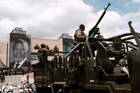 Soldiers stand in military vehicle outside at the funeral service for the former United Nations Secretary General Kofi Annan, who died in Switzerland, in Accra, Ghana September 13, 2018. REUTERS/Francis Kokoroko