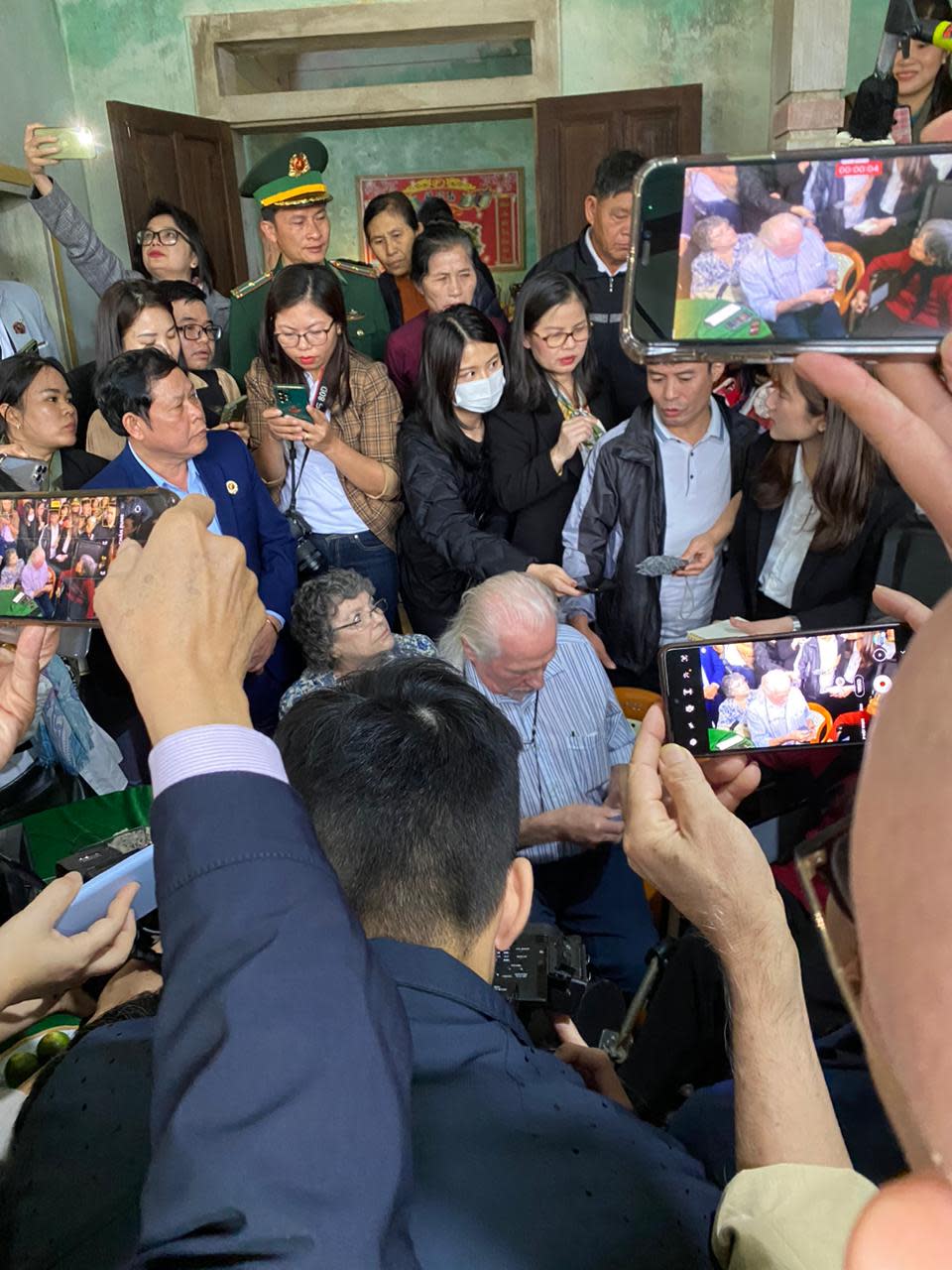 Peter Mathews arrives at the home of relatives of Cao Van Tuat, who died during the war in 1967. Asked, earlier in his visit, about the relationship between the U.S. and Vietnam, he replied, “I am not a politician. ... I am here on a humanitarian mission between myself and Vietnam.”