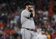 Chicago White Sox starting pitcher Lance Lynn walks back to the mound after Houston Astros' Robel Garcia hit a three-run double during the third inning of a baseball game, Saturday, June 19, 2021, in Houston. (AP Photo/Eric Christian Smith)