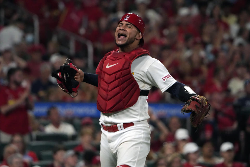 St. Louis Cardinals catcher Willson Contreras celebrates after throwing Cincinnati Reds' Will Benson out at second on a failed stolen base attempt to end the top of the seventh inning of a baseball game Friday, June 9, 2023, in St. Louis. (AP Photo/Jeff Roberson)