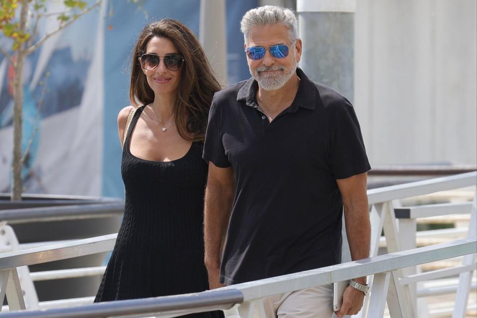 <p>Aissaoui Nacer / SplashNews</p> Amal and George Clooney depart Venice, Italy, on Sept. 1, 2023