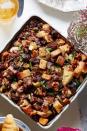 <p>Toss dried fruits such as apricots, figs, or raisins in with the apples for an added touch of sweetness to this apple-walnut stuffing. Assemble up to a day ahead, and simply cover and chill for a grab-and-go casserole. </p><p><a href="https://www.womansday.com/food-recipes/food-drinks/recipes/a40044/apple-walnut-stuffing-recipe-clx1114/" rel="nofollow noopener" target="_blank" data-ylk="slk:Get the Apple-Walnut Stuffing recipe.;elm:context_link;itc:0;sec:content-canvas" class="link "><em><strong>Get the Apple-Walnut Stuffing recipe.</strong></em></a> </p>