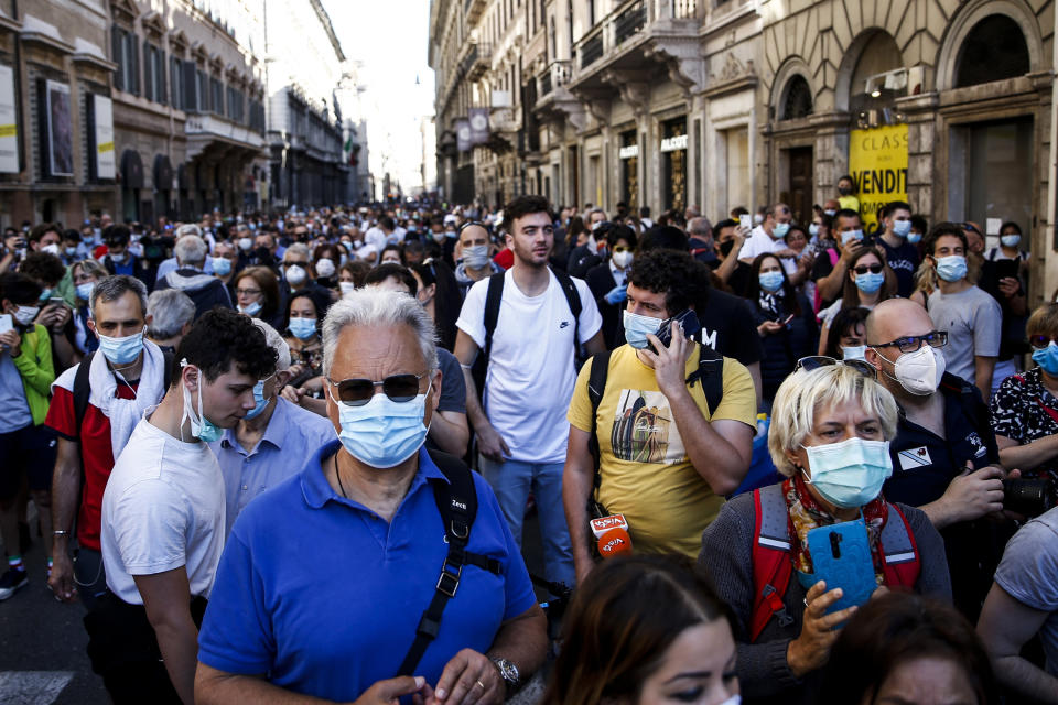 People gather in Rome, Tuesday, June 2, 2020 on the occasion of the celebrations for the 74th anniversary of the Italian Republic. (Cecilia Fabiano/LaPresse via AP)