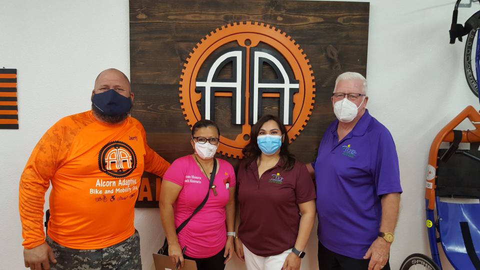 Alcorn Adaptive founder Jerry Alcorn poses with Angeles Especiales (Special Angels) President Helen Marquez, UCPIE Director of Operations Sofia Campos and UCPIE President and CEO Greg Wetmore.