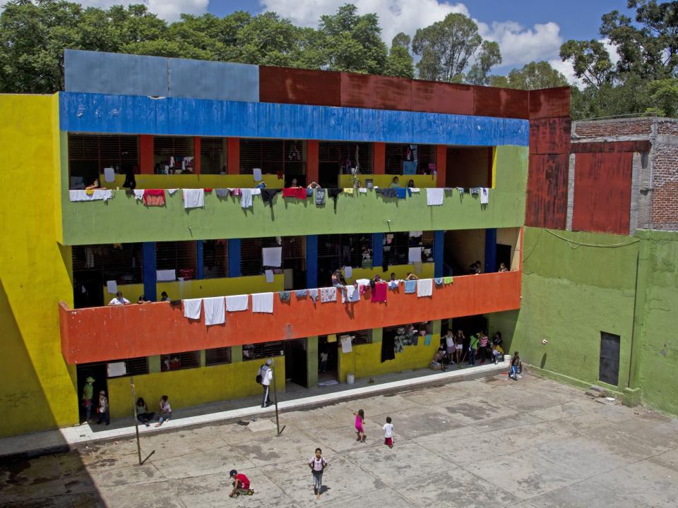 Children remain inside "La Gran Familia" shelter.