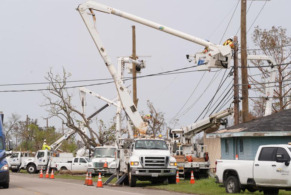 Crews work to restore Entergy power lines Sept. 12 in the Chauvin and Montegut areas about two weeks after Hurricane Ida devastated the area.