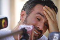 Neurologist Leopoldo Luque, Diego Maradona's former personal doctor, talks with journalists at his home in Buenos Aires, Argentina, Sunday, Nov. 29, 2020. Dr. Luque's house and offices were raided Sunday in the midst of investigations to establish the circumstances of the death of Maradona. (Fabian Marelli/La Nacion via AP)