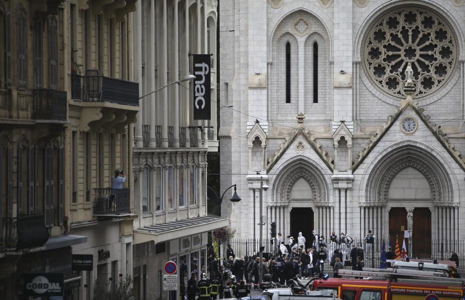 Police officers work at the Notre Dame church in Nice, southern France, after a knife attack took place on October 29, 2020.