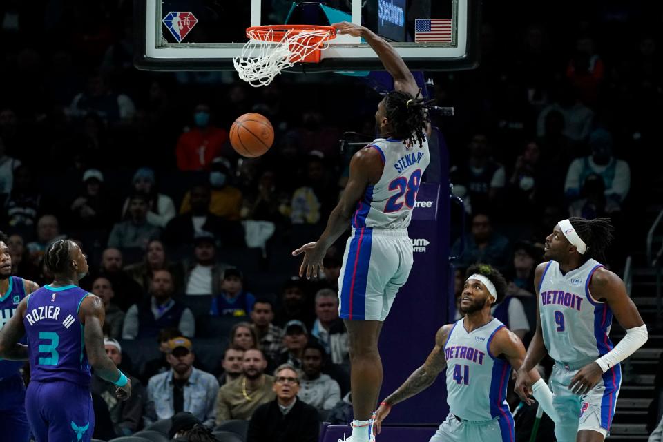 Detroit Pistons center Isaiah Stewart scores against the Charlotte Hornets during the first half of an NBA basketball game on Sunday, Feb. 27, 2023, in Charlotte, N.C.