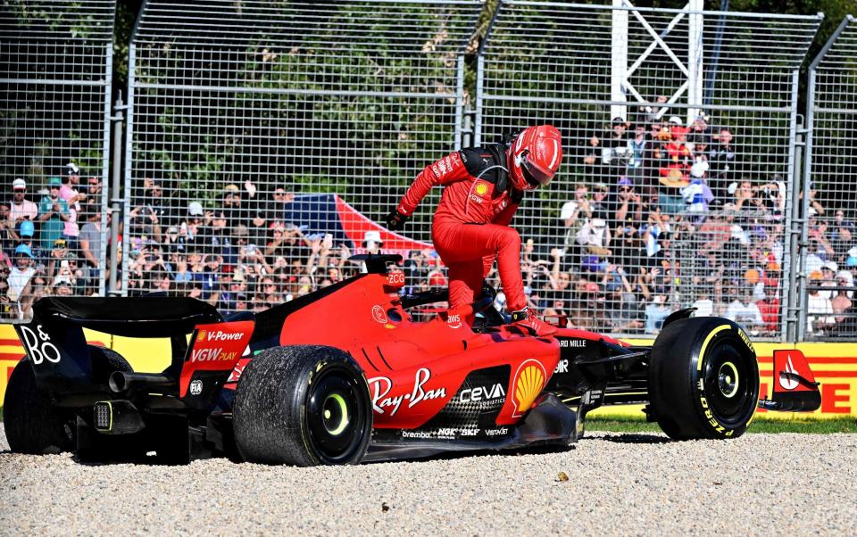 Ferrari's Monegasque driver Charles Leclerc jumps out of the car after a crash during the 2023 Formula One Australian Grand Prix at the Albert Park Circuit in Melbourne on April 2, 2023 - Paul Crock/Getty Images