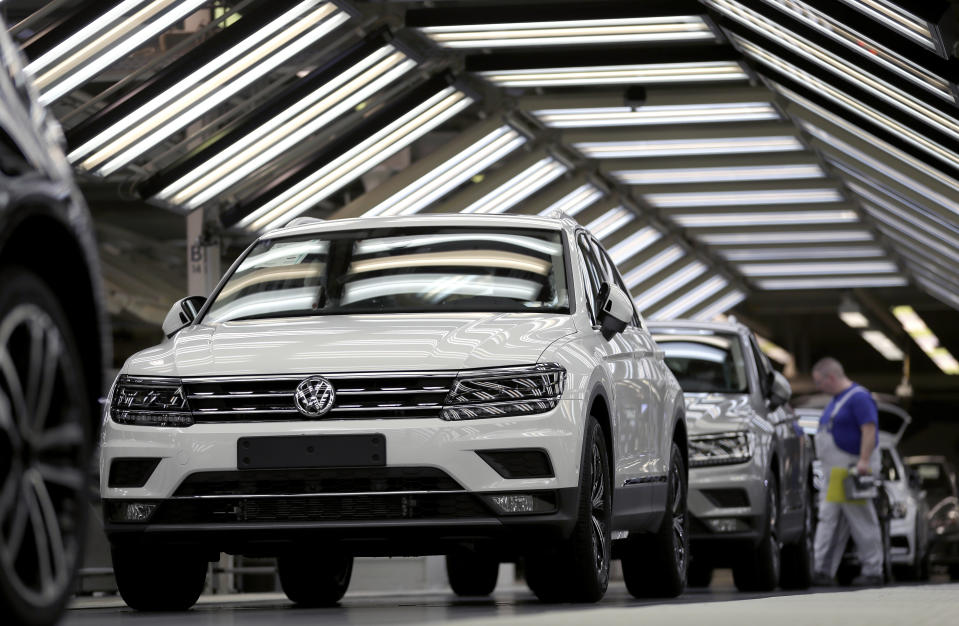 In this Thursday, March 8, 2018 photo Volkswagen cars are pictured during a final quality control at the Volkswagen plant in Wolfsburg, Germany. Germany's Volkswagen, Europe's largest automaker, is warning the Trump administration's decision to impose tariffs on aluminum and steel imports from Canada, Mexico, and the European Union could start a trade war that no side would win. (AP Photo/Michael Sohn)