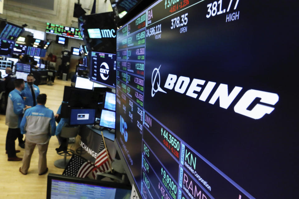 The logo for Boeing appears above its trading post on the floor of the New York Stock Exchange, Wednesday, March 13, 2019. President Donald Trump says the U.S. is issuing an emergency order grounding all Boeing 737 Max 8 and Max 9 aircraft in the wake of a crash of an Ethiopian Airliner. (AP Photo/Richard Drew)