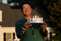 Hideki Matsuyama, of Japan, holds the trophy after winning the Masters golf tournament on Sunday, April 11, 2021, in Augusta, Ga. (AP Photo/David J. Phillip)