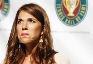Tennis Hall of Fame inductee Jennifer Capriati reacts as she is introduced at a news conference at the International Tennis Hall of Fame in Newport, Rhode Island July 14, 2012. REUTERS/Jessica Rinaldi