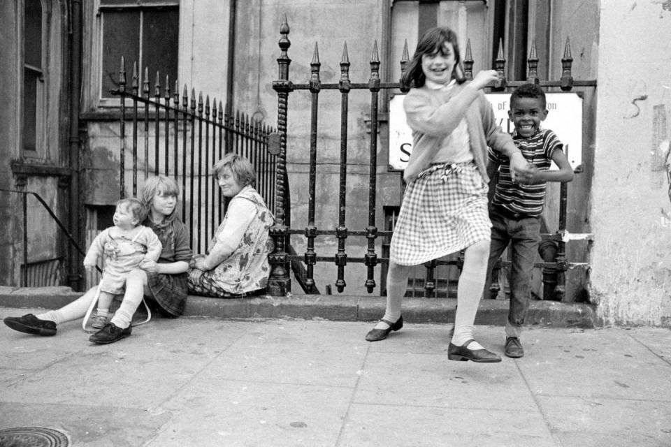 1964: A group of children playing in the street in Powis Square. (Richard Braine/PYMCA/Rex)