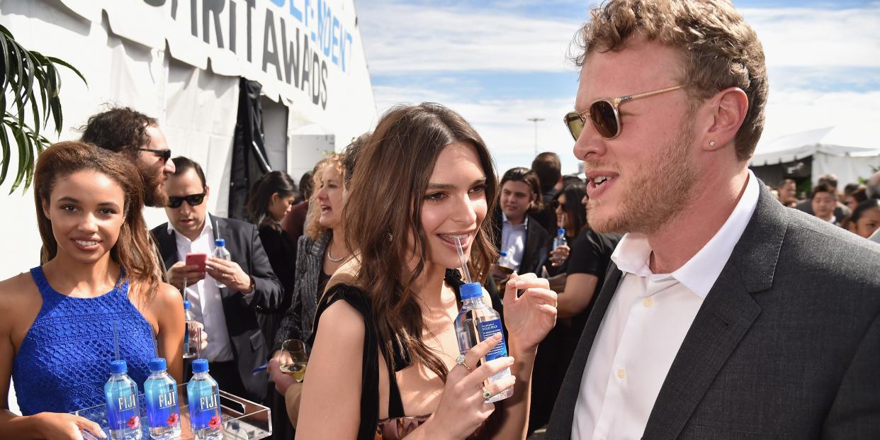 Emily Ratajkowski (L) and Sebastian Bear-McClard with FIJI Water during the 33rd Annual Film Independent Spirit Awards on March 3, 2018 in Santa Monica, California.