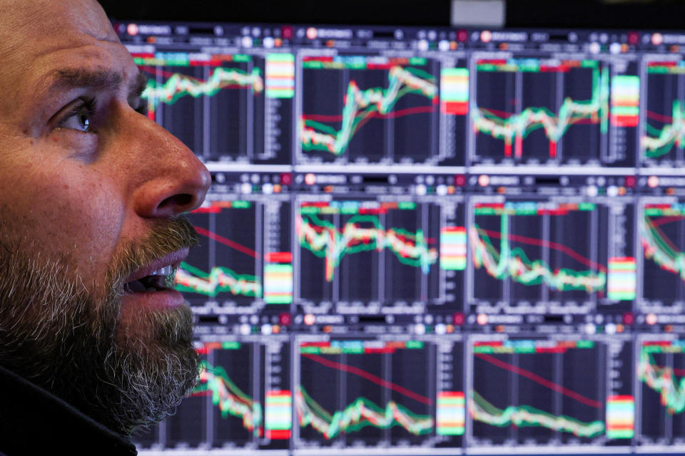 FTSE  A specialist trader works on the floor of the New York Stock Exchange (NYSE) in New York City, U.S., December 9, 2022.  REUTERS/Brendan McDermid