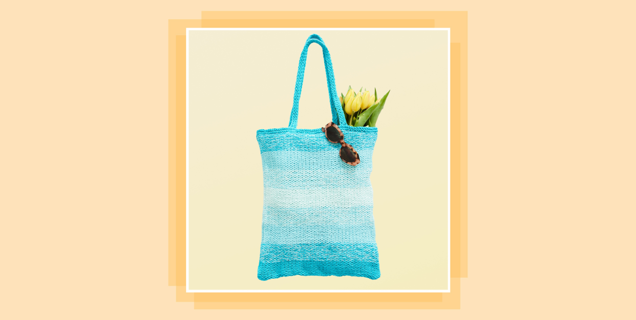 knitted tote bag with sunglasses and tulips