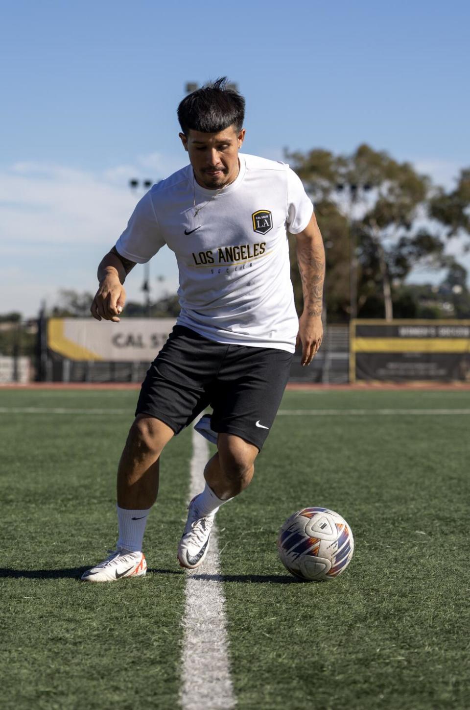 Cal State L.A. soccer player Bryan Ortega practices at Jesse Owens Stadium on Nov. 14.