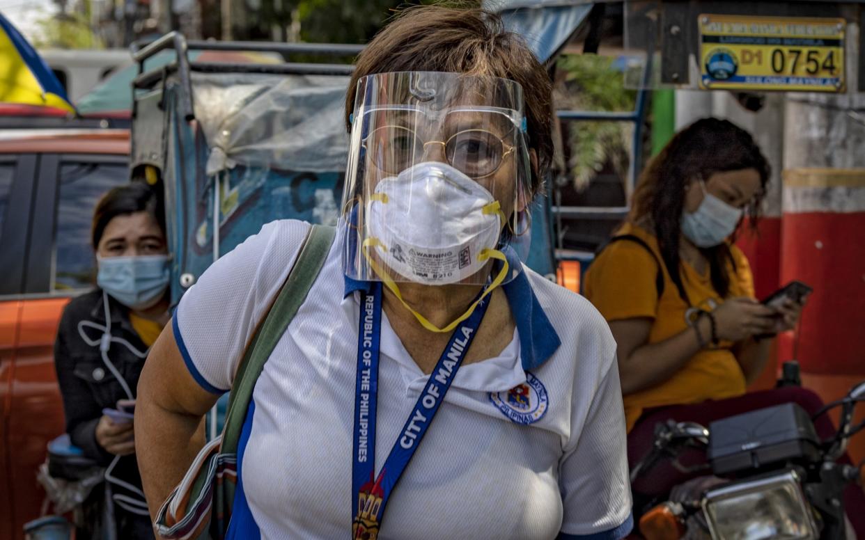 People queue for a Covid-19 test in Manila  - Ezra Acayan/Getty Images