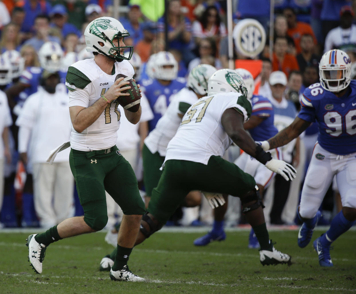 UAB quarterback A.J. Erdely (11) looks for a receiver as he is rushed by Florida defensive lineman Cece Jefferson (96) during the first half of an NCAA college football game, Saturday, Nov. 18, 2017, in Gainesville, Fla. (AP Photo/John Raoux)
