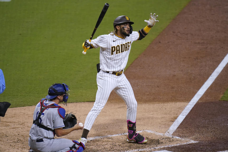 San Diego Padres' Fernando Tatis Jr reacts to a called strike while batting during the sixth inning of the team's baseball game against the Los Angeles Dodgers on Saturday, April 17, 2021, in San Diego. (AP Photo/Gregory Bull)