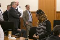 Olivia Thibou, sister of the victim, walks back to her seat after former NFL player Aaron Hernandez was convicted in his murder trial at the Bristol County Superior Court in Fall River, Massachusetts, April 15, 2015. Hernandez, 25, a former tight end for the New England Patriots, is convicted of fatally shooting semiprofessional football player Odin Lloyd in an industrial park near Hernandez's Massachusetts home in June 2013. REUTERS/Dominick Reuter