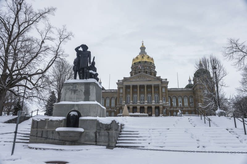 The Iowa State Capitol is surrounded with snow after a heavy storm swept the Midwest this week, causing slippery roads and extensive power outages. According to reports, more than 160 million people were under weather alerts as the storm moves east. Photo by Tannen Maury/UPI
