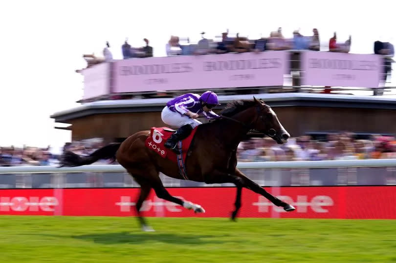 Point Lonsdale, ridden by jockey Ryan Moore, on the way to winning the tote.co.uk Supporting Racing Ormonde Stakes on day two of the 2024 Boodles Chester May Festival at Chester Racecourse on Thursday, May 9 2024