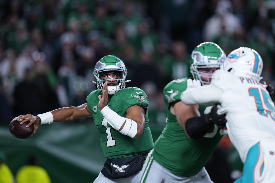 Philadelphia Eagles quarterback Jalen Hurts (1) made a few big plays to help his team to a win over the Dolphins. (AP Photo/Matt Rourke)