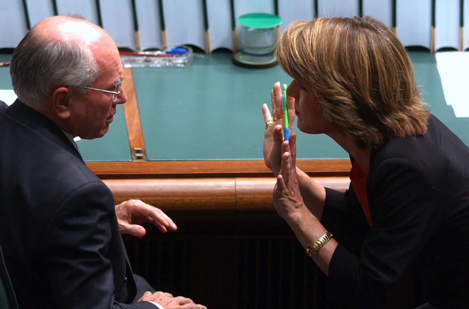 Ms Bishop with then prime minister John Howard in 2004.