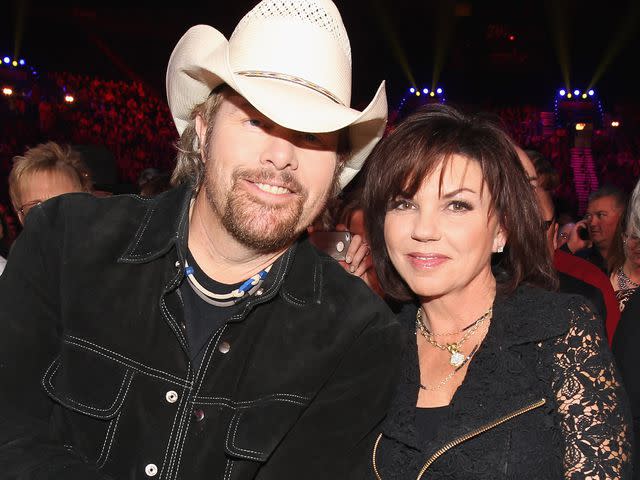 <p>Christopher Polk/ACA2011/Getty</p> Toby Keith and wife Tricia Covel attend the American Country Awards 2011 on December 5, 2011 in Las Vegas, Nevada.