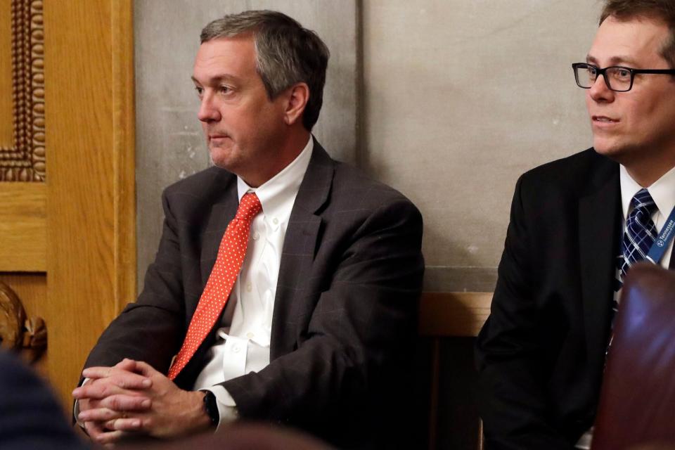 Mandatory Credit: Photo by Mark Humphrey/AP/Shutterstock (10561649a) Tennessee Secretary of State Tre Hargett, left, attends a House session, in Nashville, Tenn. Hargett, who had previously argued the original 2019 voter registration law would bolster election security, is submitting a separate bill in 2020 that will criminalize "intentional dissemination of misinformation" surrounding the qualifications to vote, voter registration requirements, voter eligibility and polling dates, times and locations Voter Registration Tennessee, Nashville, USA - 15 Apr 2019