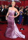 <b>Charlize Theron, 2010</b><br>Dior Haute Couture with pasties -- who knew? At least, that was the effect that the leggy Theron created in her mauve strapless number with two strategically placed satin roses and a crisscrossed tail in lilac. The gown, by John Galliano for Christian Dior, got some hate, but the actress <a href="http://www.usmagazine.com/celebrity-news/news/charlize-theron-defends-her-oscar-dress-201083" rel="nofollow noopener" target="_blank" data-ylk="slk:gamely said;elm:context_link;itc:0;sec:content-canvas" class="link ">gamely said</a> in response to critics, "I just loved this dress." Maybe it needed a couple of tassels.