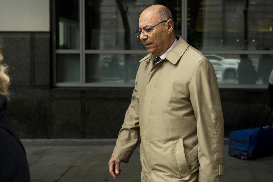 Former Philadelphia police detective Manuel Santiago leaves the Juanita Kidd Stout Center for Criminal Justice, Friday, April 5, 2024, in Philadelphia. Three long-retired Philadelphia police detectives, Martin Devlin, Manuel Santiago and Frank Jastrzembski, are accused of lying under oath at the 2016 retrial of a man the jury exonerated in a 1991 rape and murder. The case, if it proceeds to trial in November, would mark a rare time when police or prosecutors face criminal charges for flawed work that leads to wrongful convictions. (AP Photo/Joe Lamberti)