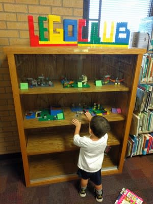 Toddler loving the Lego Center (Deborah Fallows)