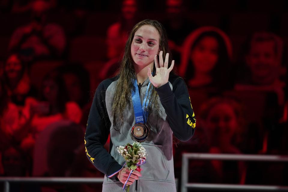 Emma Weyant waves at the award ceremony after winning the Women's 400 Individual Medley at the U.S. Olympic Swim Trials on Sunday, June 13, 2021, in Omaha, Neb. (AP Photo/Charlie Neibergall)