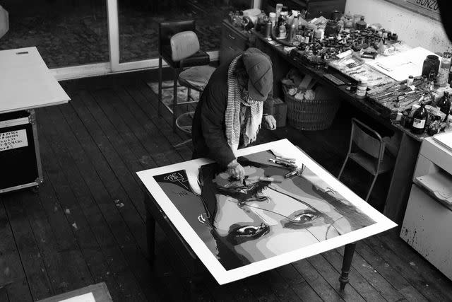 <p>Image Courtesy of Castle Fine Art | Elliot-Nyman</p> Johnny Depp working on his self portrait 'Five'