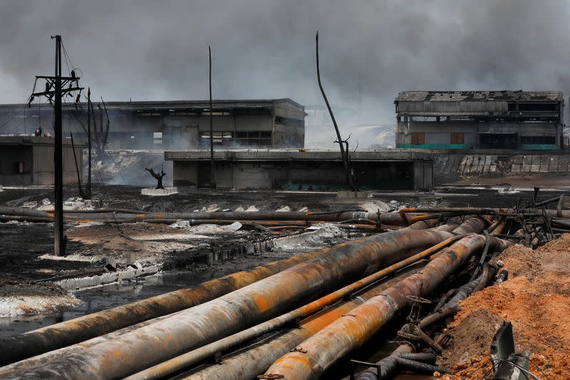 FILE PHOTO: Major fire spreads at Cuban fuel storage facility hit by lightning