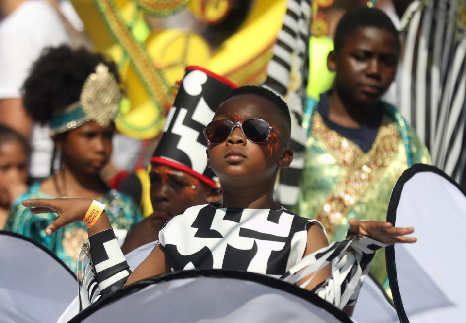 A child reveller gestures at the Notting Hill Carnival in London, Britain August 25, 2019. (Photo: Simon Dawson/Reuters)