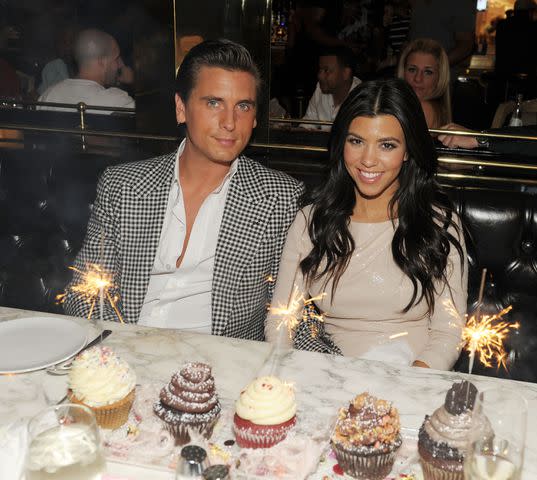 <p>Photo by Denise Truscello/WireImage</p> Kourtney Kardashian and Scott Disick at Sugar Factory at Paris Las Vegas on May 27, 2011 in Las Vegas, Nevada.