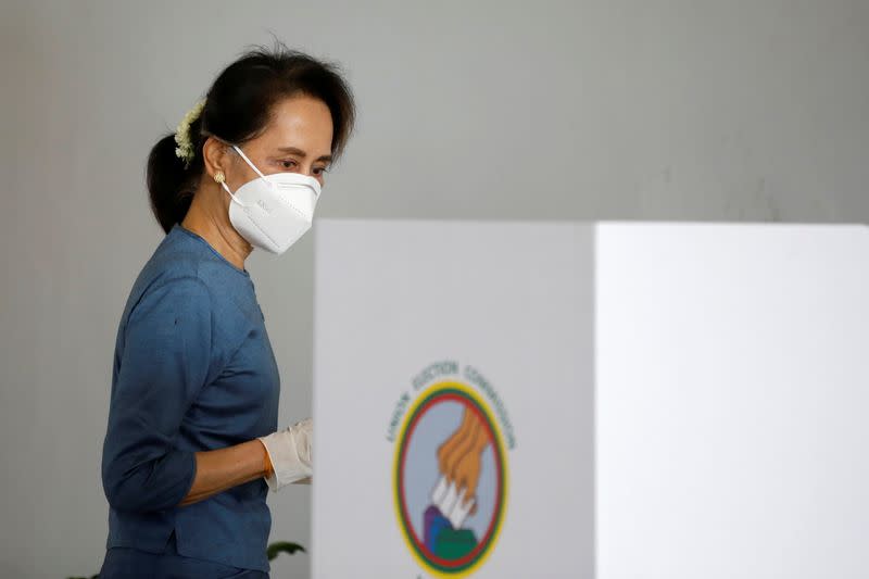 Myanmar State Counselor Aung San Suu Kyi arrives for an early vote ahead of November 8th general election in Naypyitaw, Myanmar