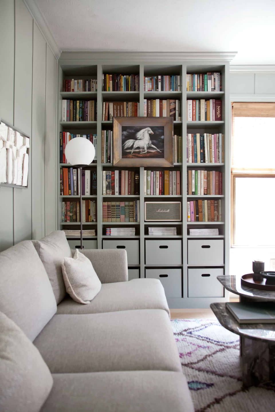 a living room with a bookcase